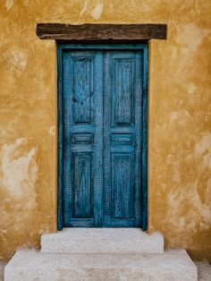 closed blue wooden door