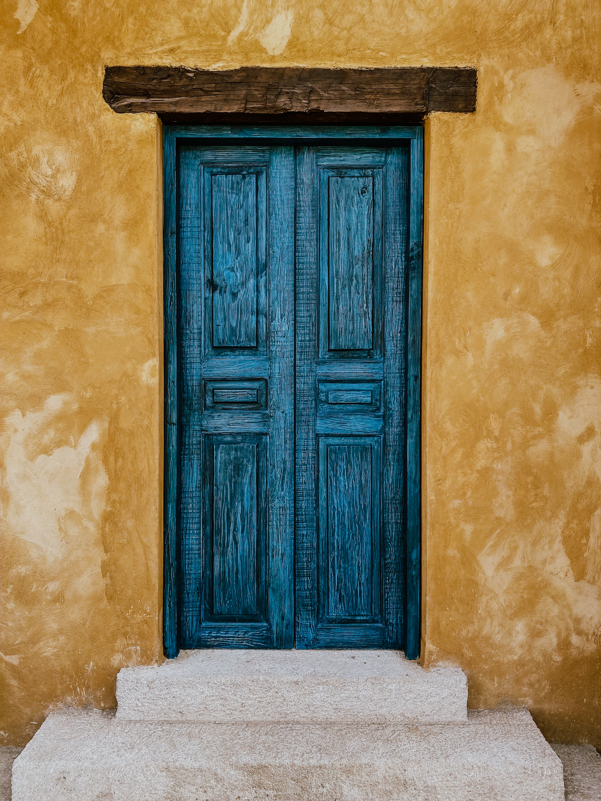 closed blue wooden door