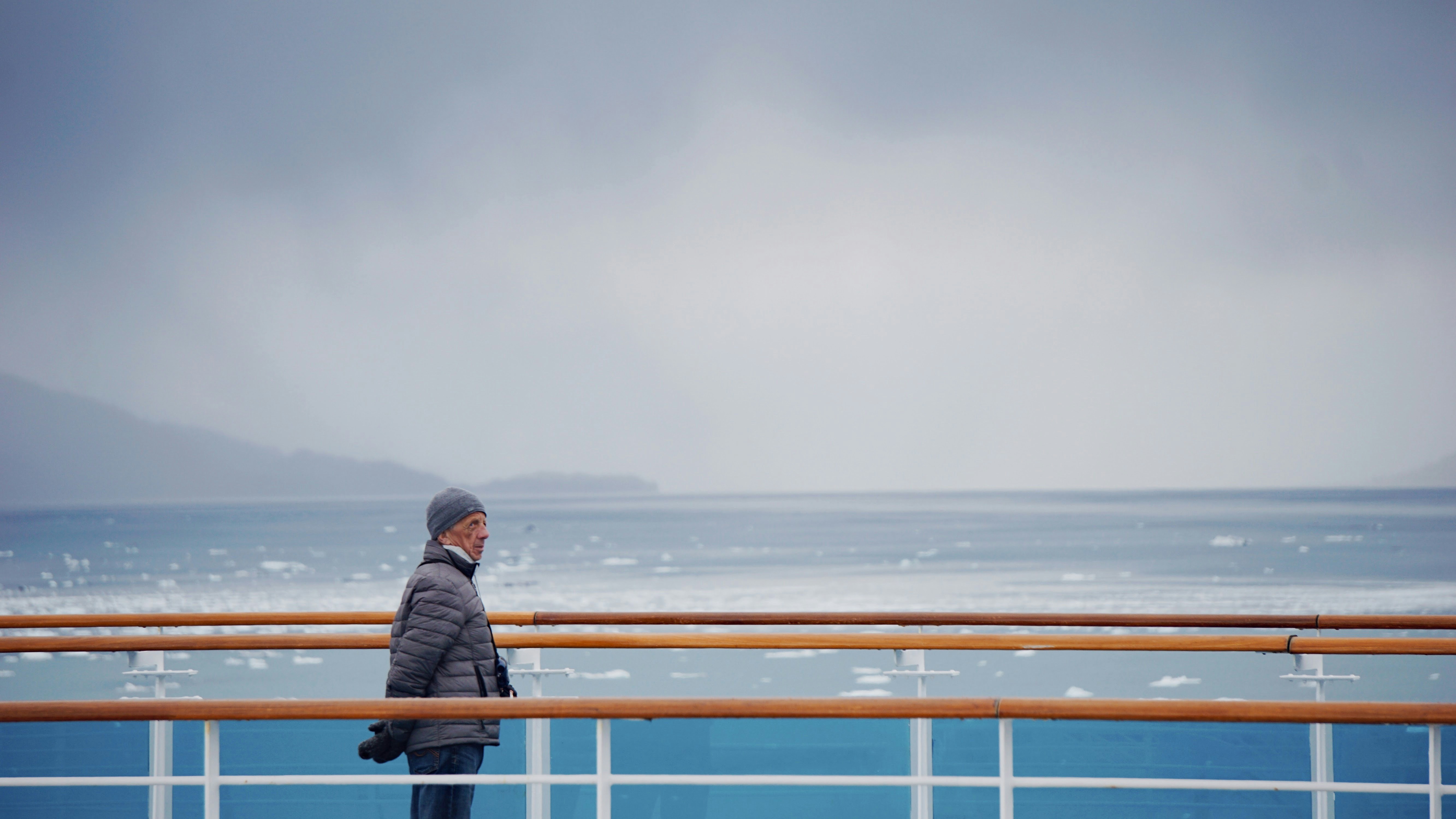 man standing on bridge, Seemingly wise man at sea