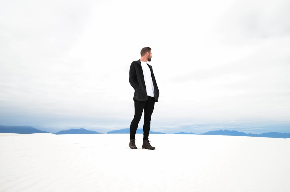 man standing on snowfield