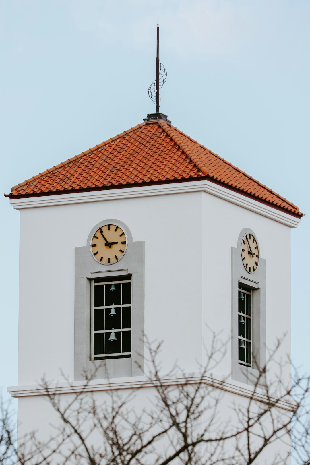 brown and white building with clock