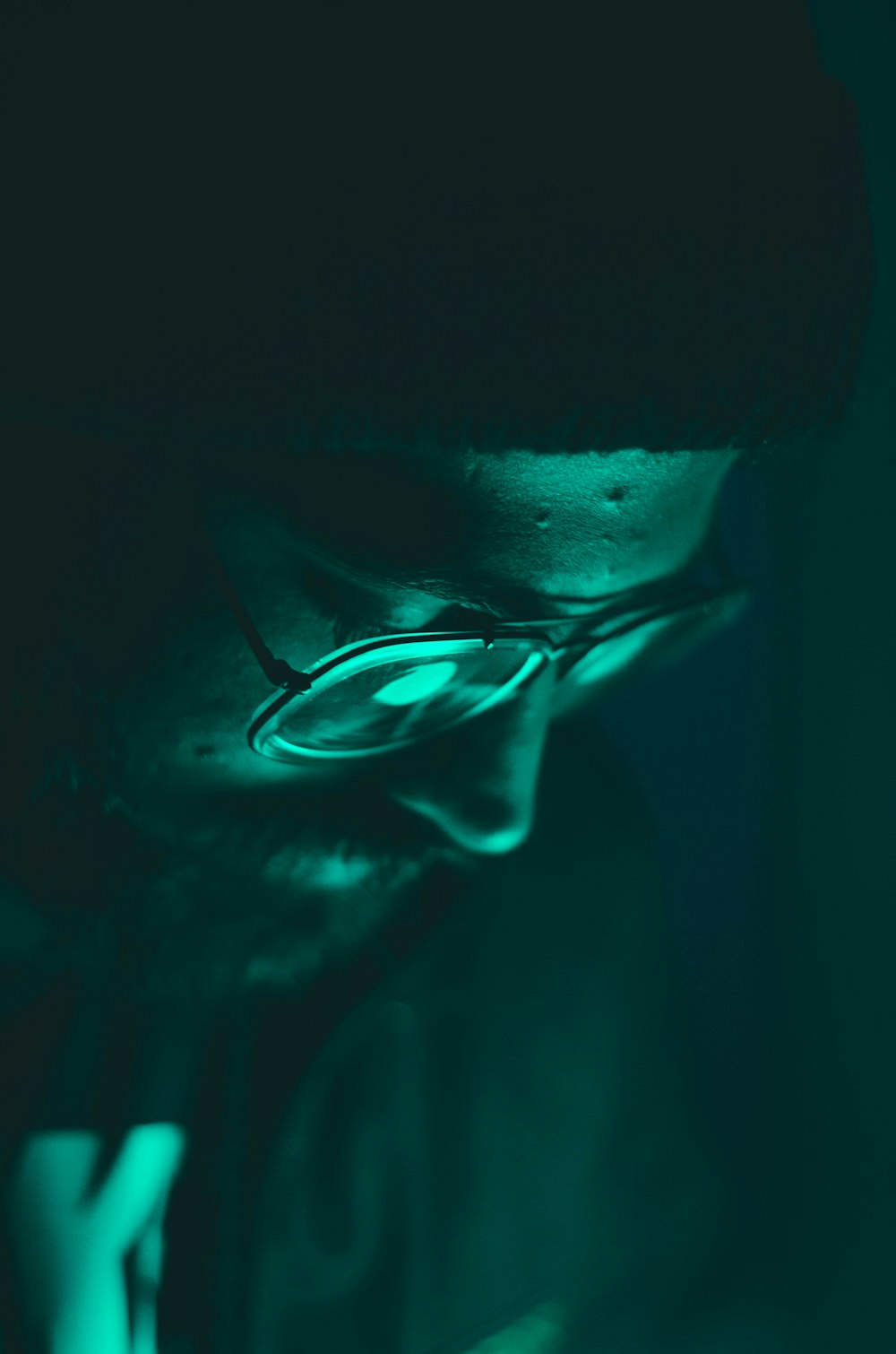 man wearing black framed eyeglasses