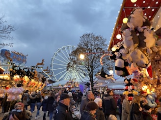 A vibrant event showcasing various stalls and attendees enjoying the fair.