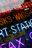 Bright and colorful Y2K style hair station with retro posters and neon lights.