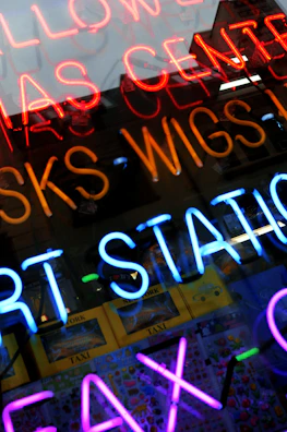 Bright and colorful Y2K style hair station with retro posters and neon lights.