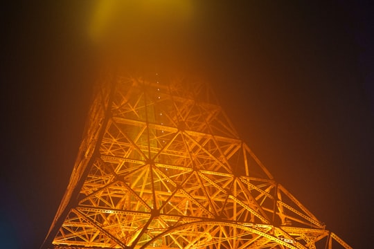 low-angle photography of Eiffel Tower in Tokyo Tower Japan
