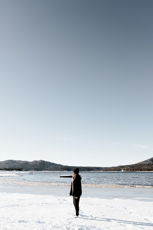 woman standing near body of water in Big Bear Lake United States