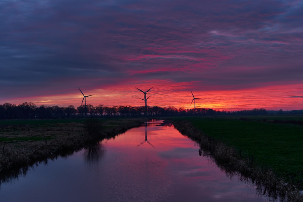 silhouette of wind turbines