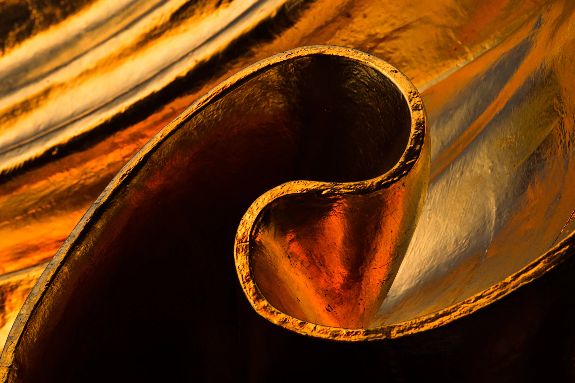 Molten brass worked on the American Whistle factory floor