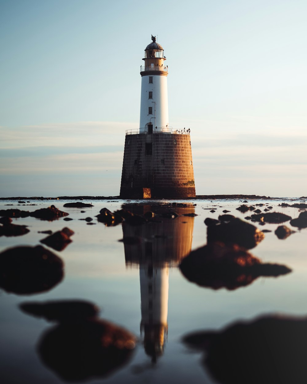 shallow focus photo of white lighthouse