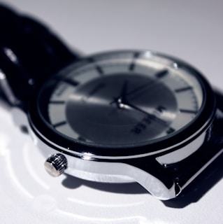 Close-up of a vintage-inspired wristwatch, its sleek design blending retro charm with contemporary style.