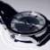 Close-up shot of a sleek, modern watch with sharp focus and soft background blur.