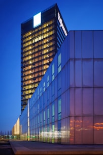 blue and brown high-rise buildings during night time