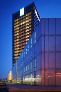 blue and brown high-rise buildings during night time