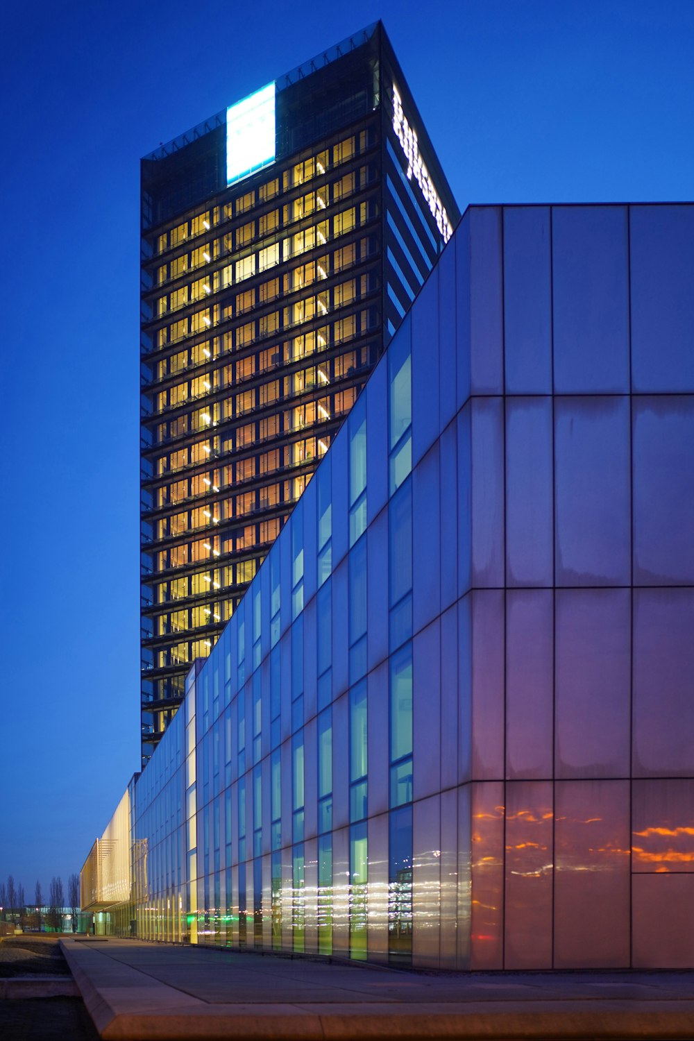 blue and brown high-rise buildings during night time