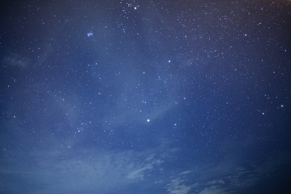 blue and white sky during night time