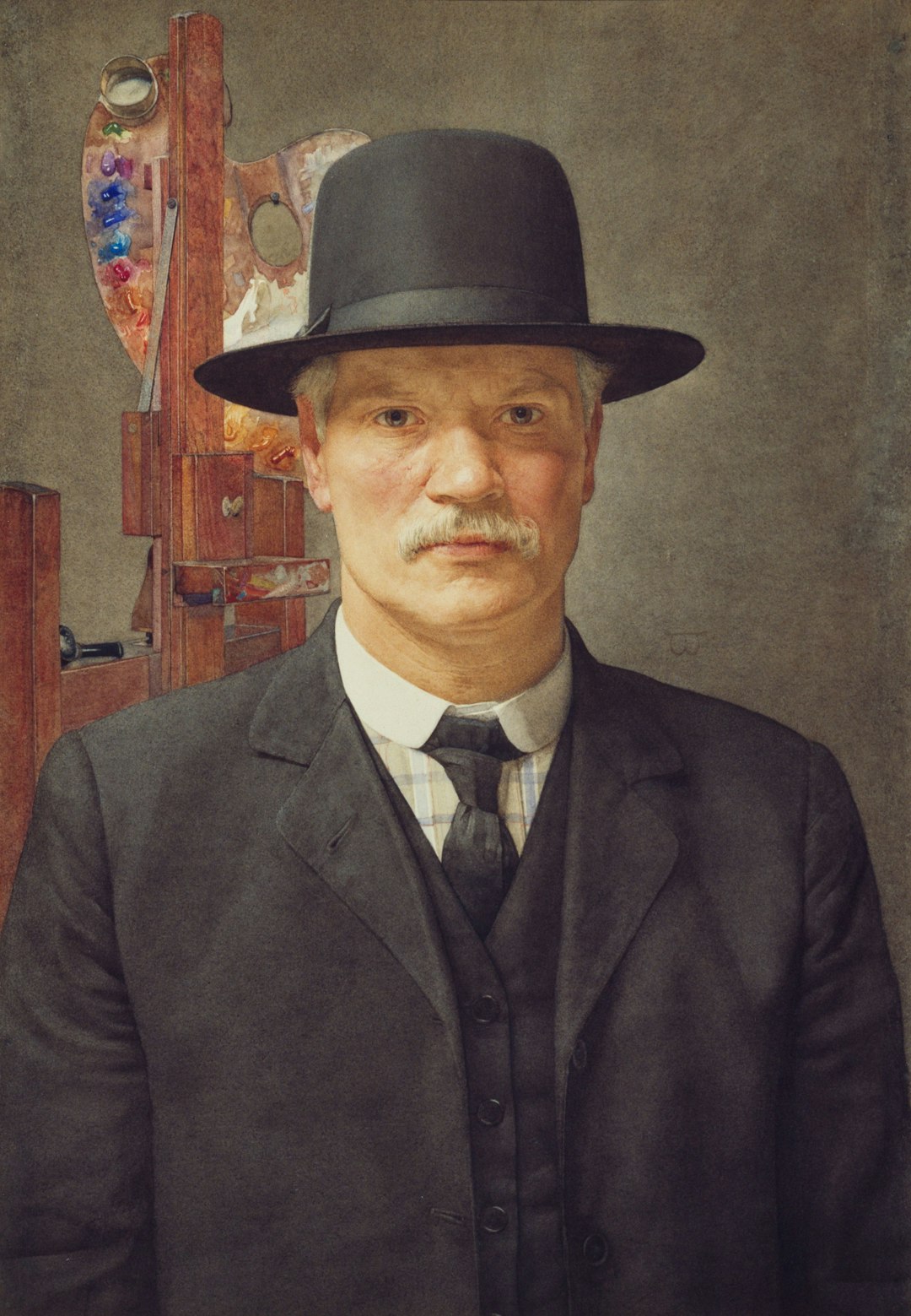 man in black suit painting