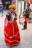 two men dancing on street in an event