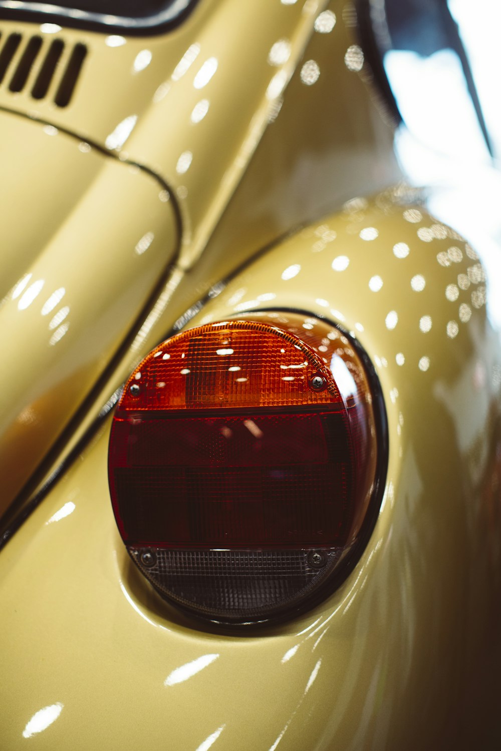 brown Volkswagen beetle