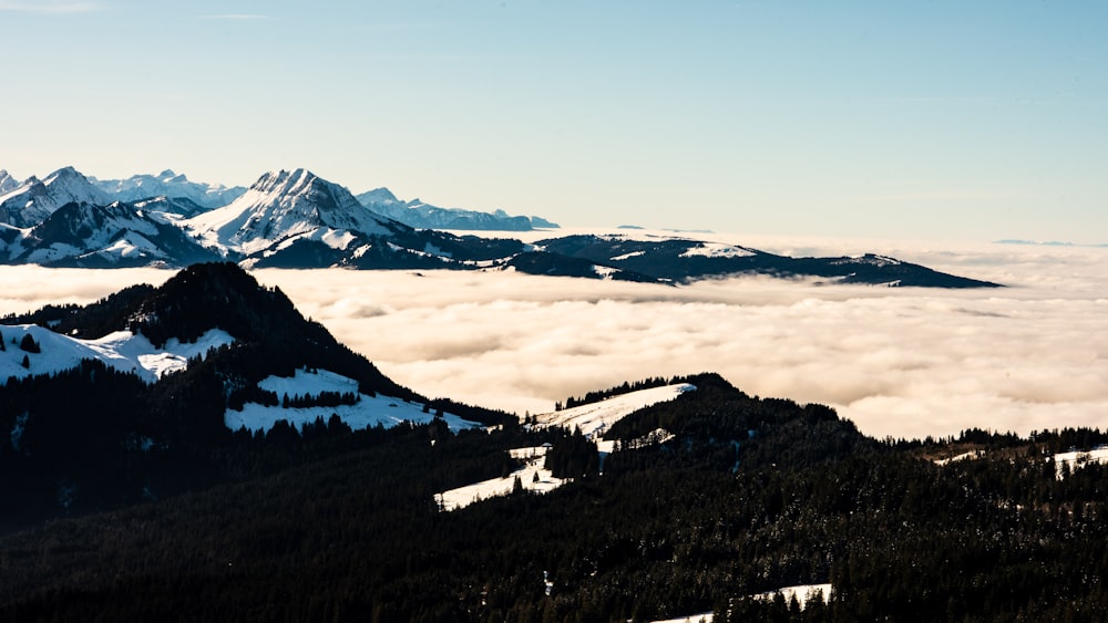 mountain covered with snow during daytime