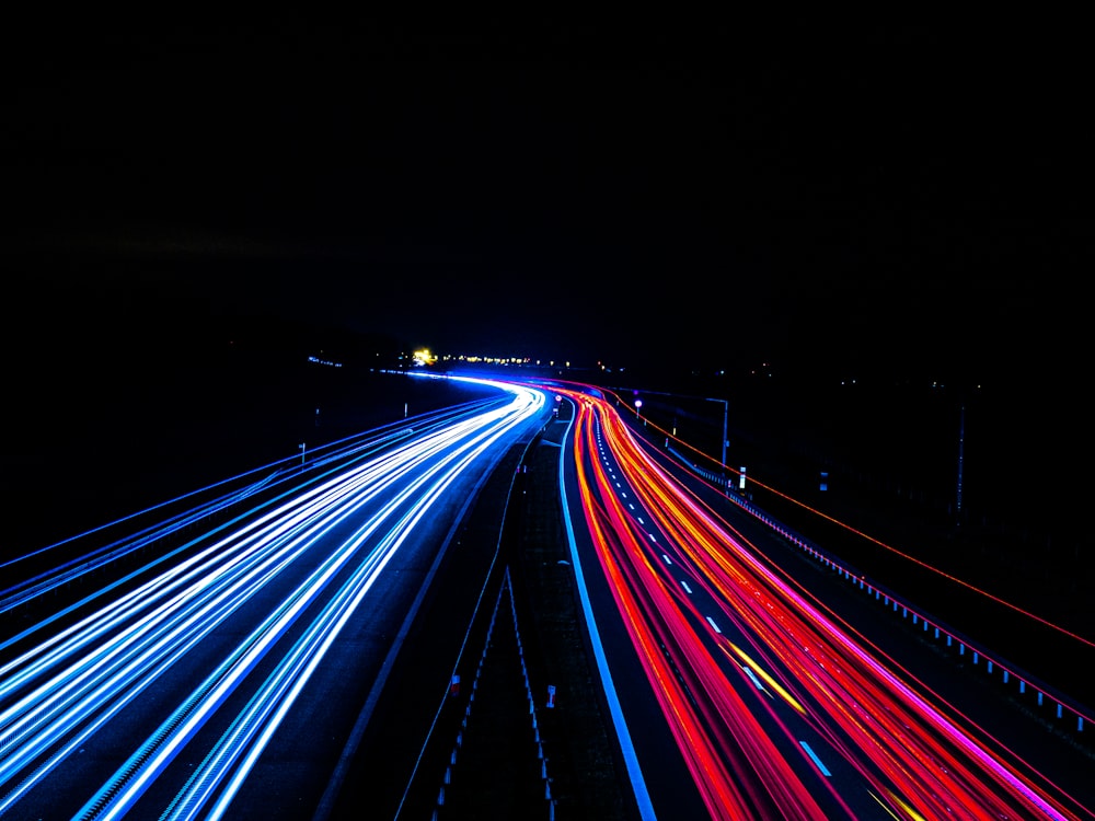 time lapse photography of road during night time