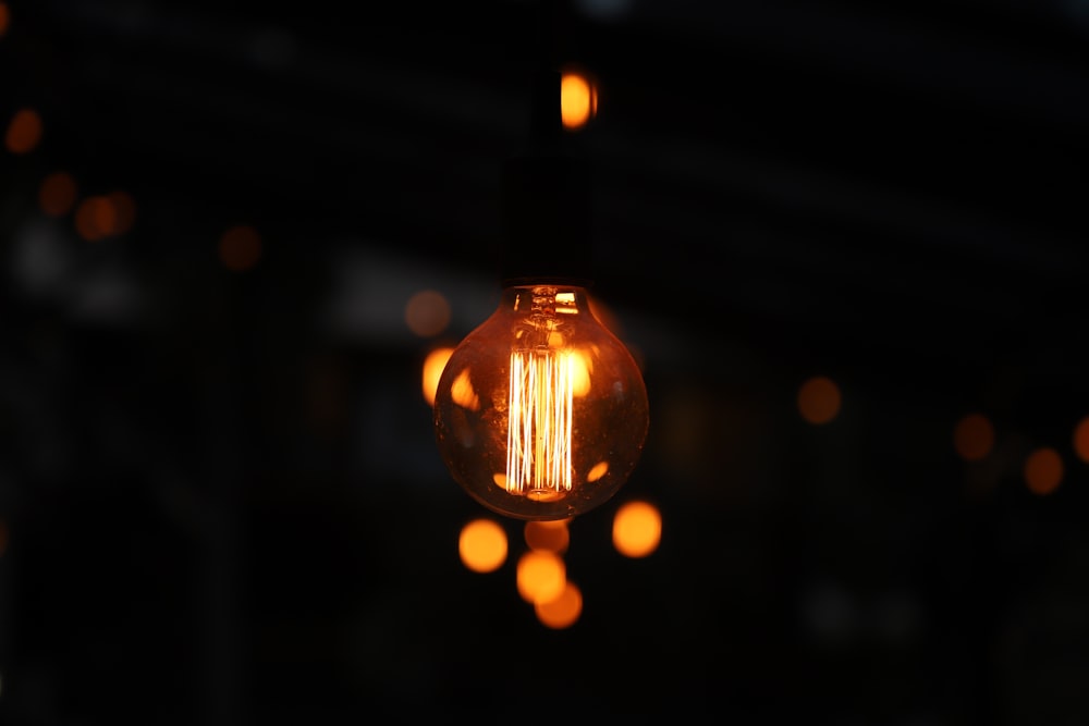 lighted clear light bulb