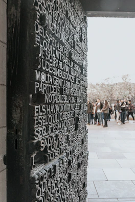 3D raised letters mounted on a building facade