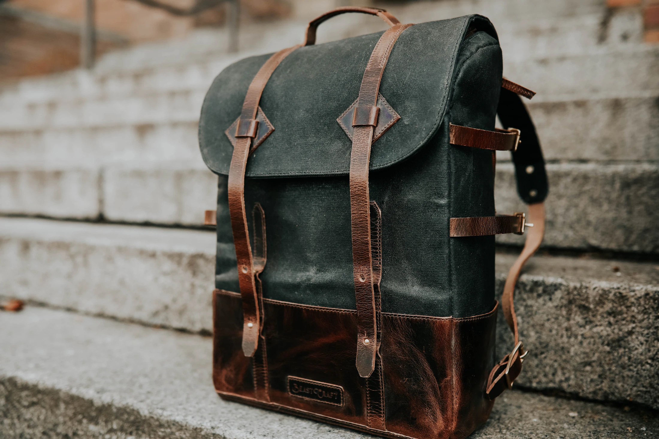 Minimal black carry equipment on dark floor