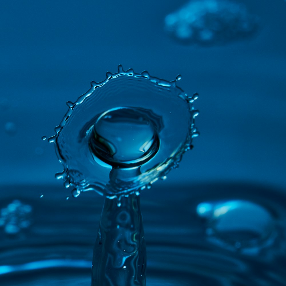 selective focus photography of splashing water