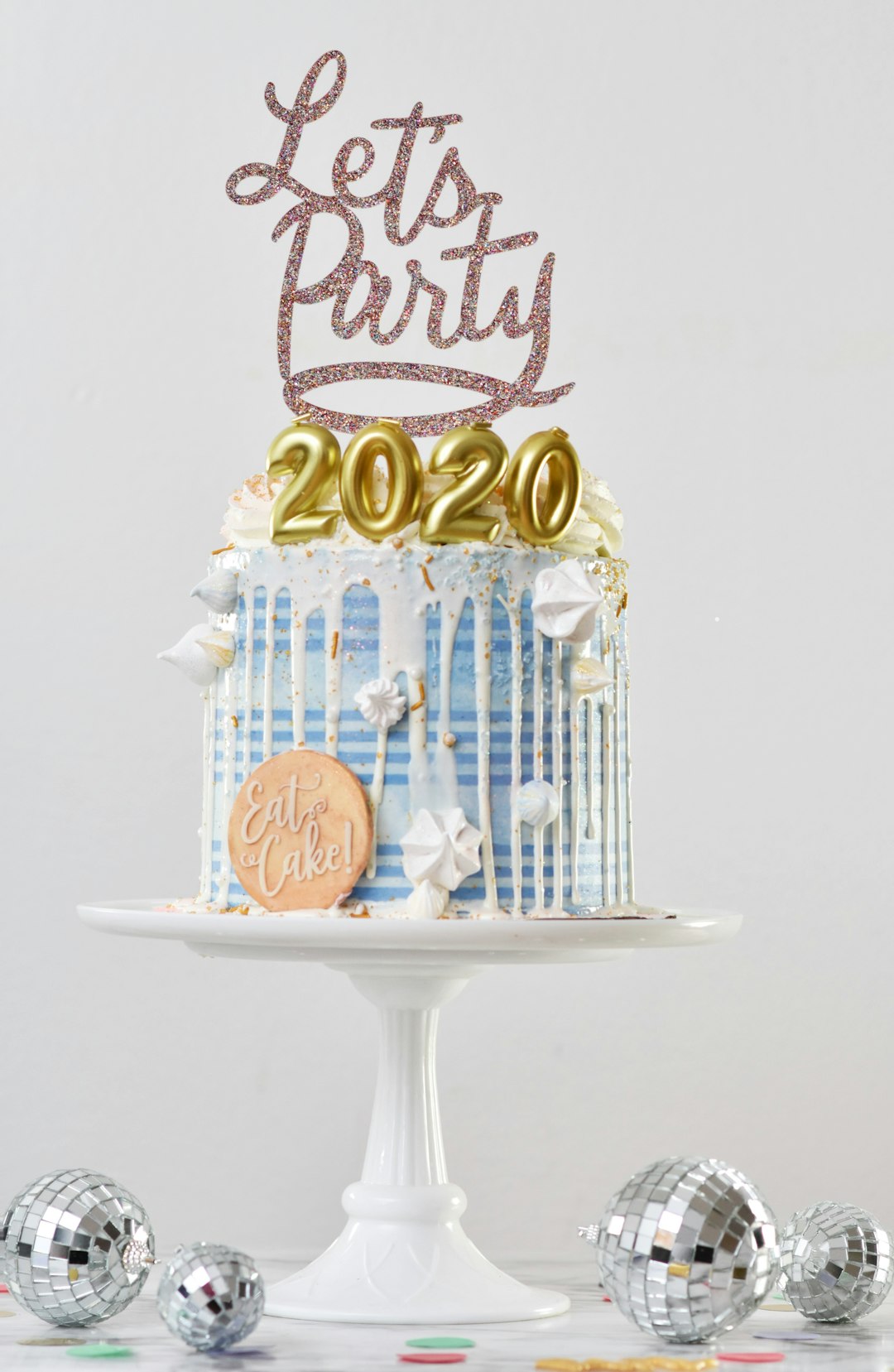 Let's Party 2020 cake on stand