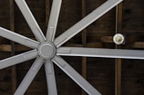 brown and gray ceiling fan