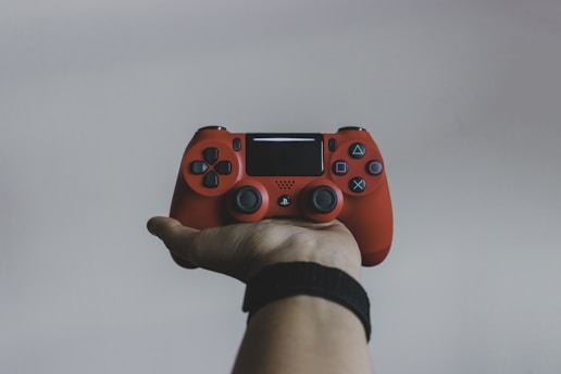joystick in the hand of a gamer