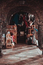 A vibrant market stall designed by Stallcraft, showcasing sleek woodwork and colorful banners under soft lighting.