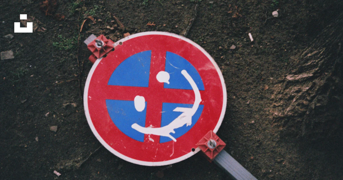 Round red and blue road signage photo – Free Red Image on Unsplash