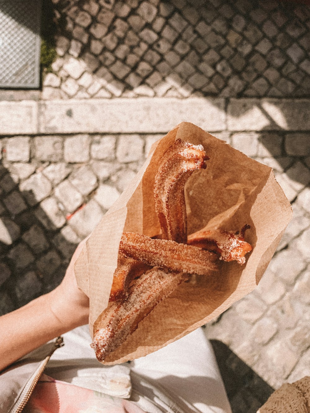 food strips in paper bag