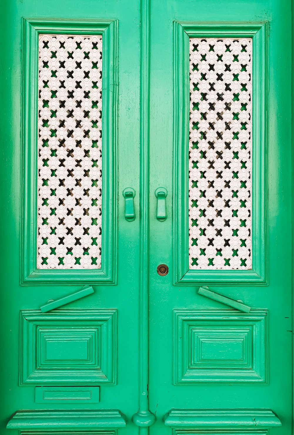 closed green French doors