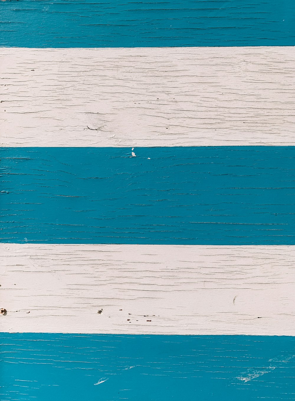 white and teal stripe surface