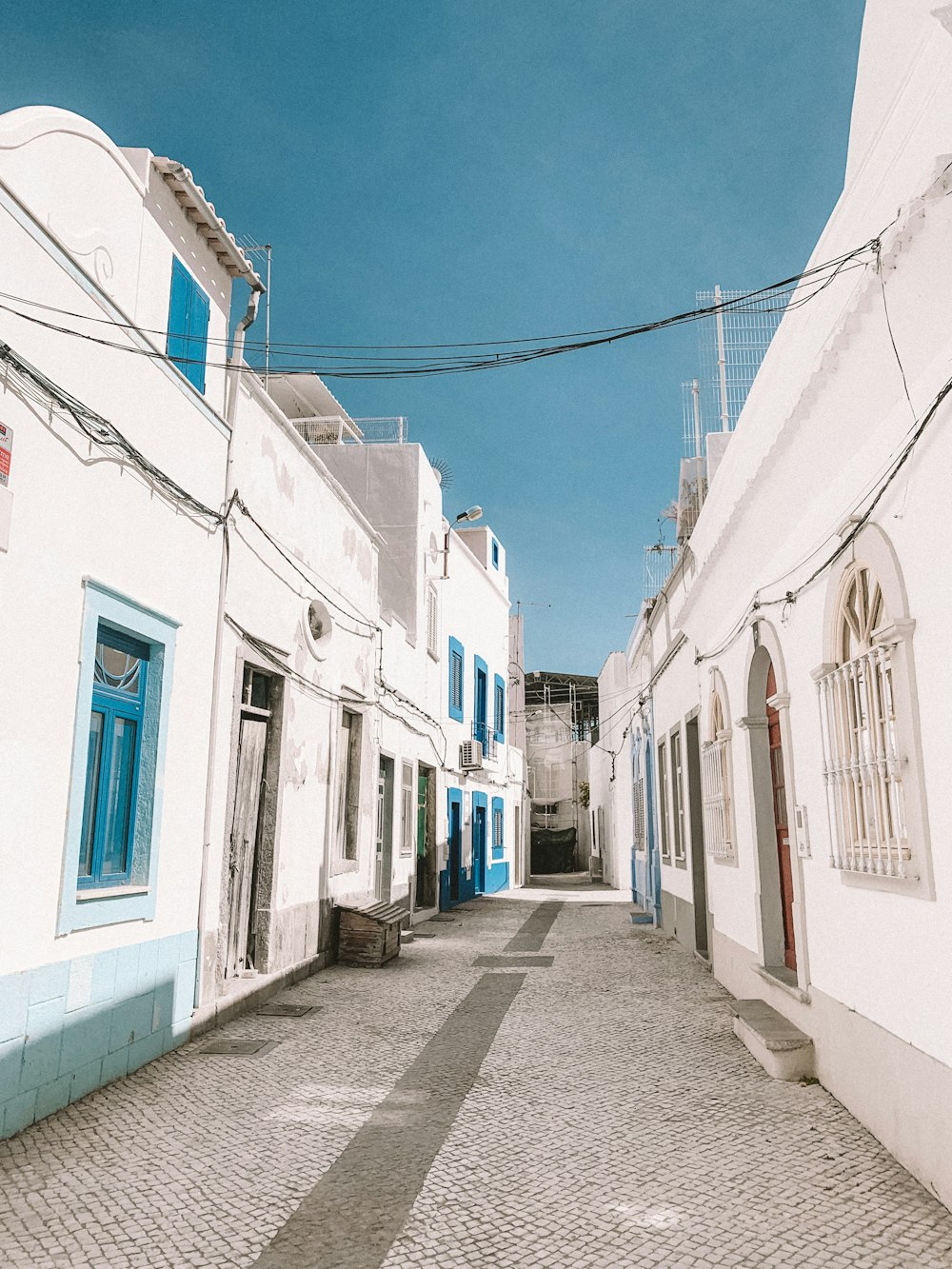 road between buildings during day