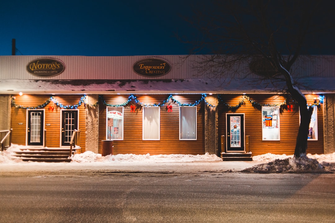 snow covered building during night