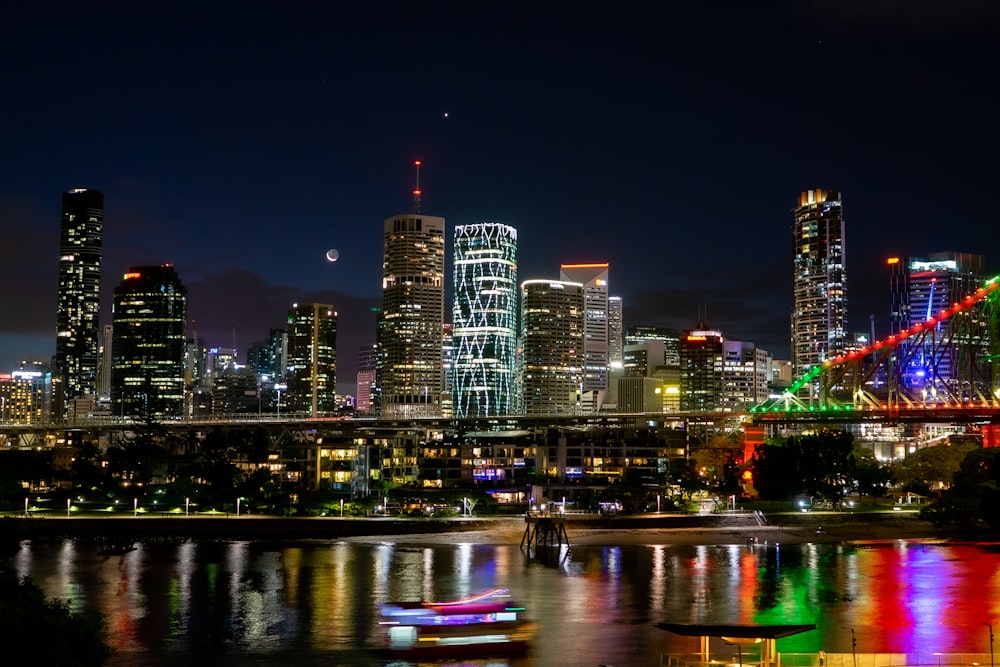 city and body of water during night