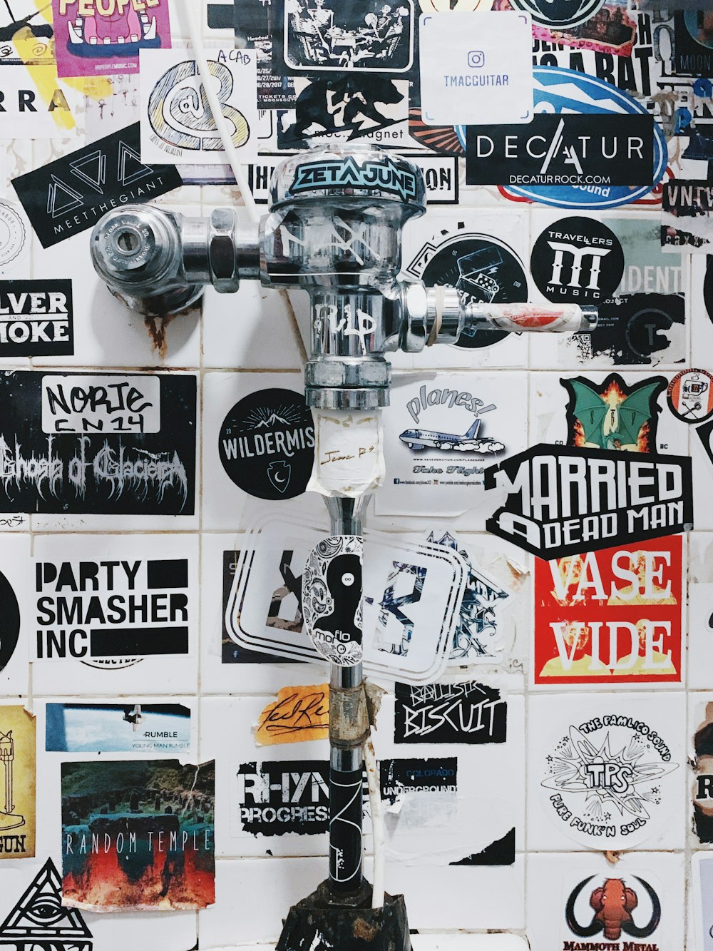 assorted stickers on wall