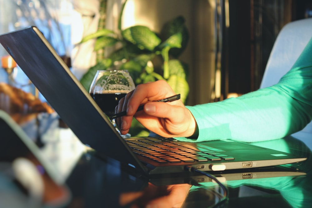 person using laptop