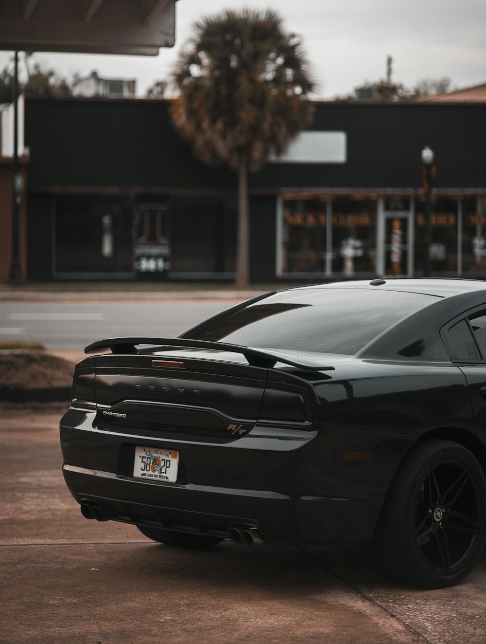 parked black car near building