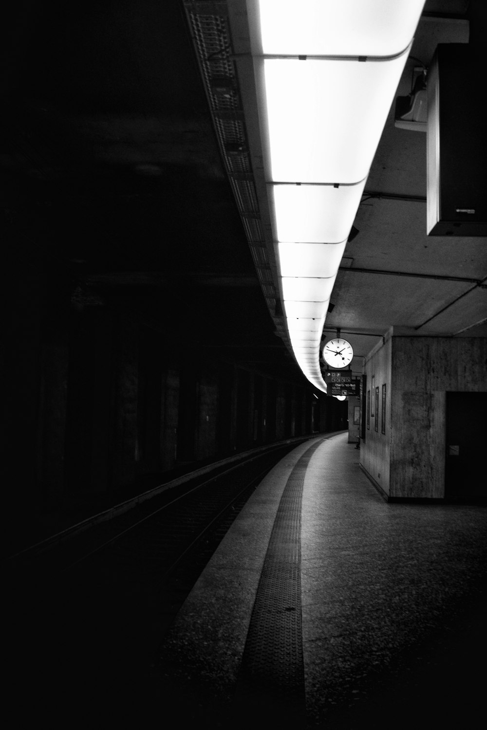 grayscale photo of train station