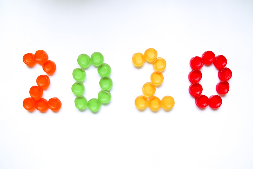 a word made out of gummy bears on a white surface