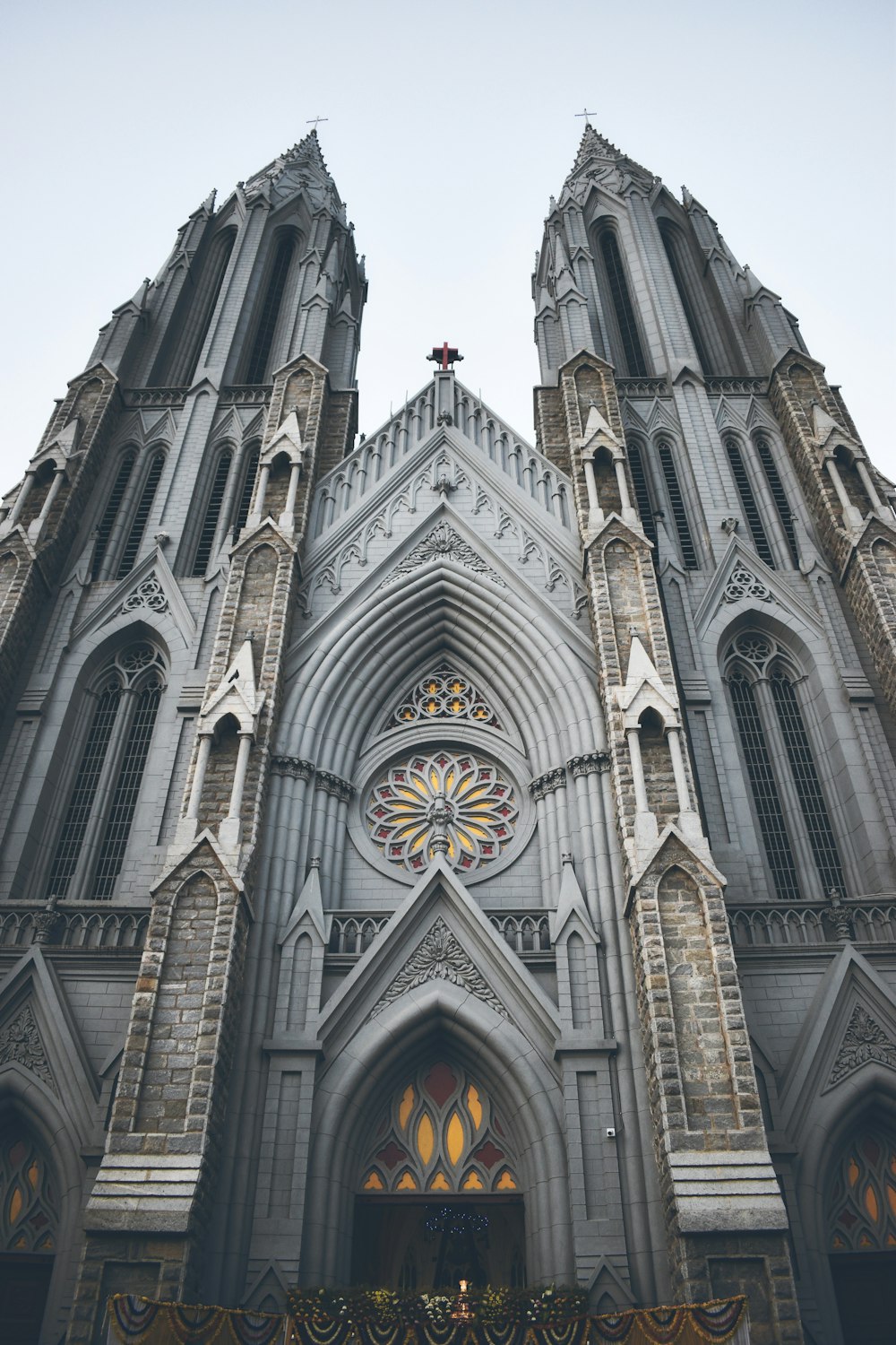 bottom view of cathedral under white sky