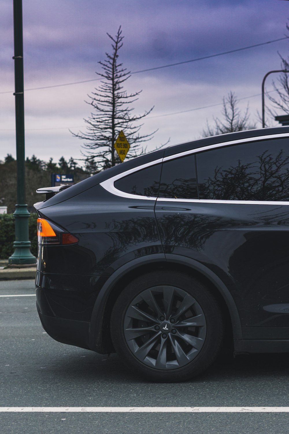 black car in the road