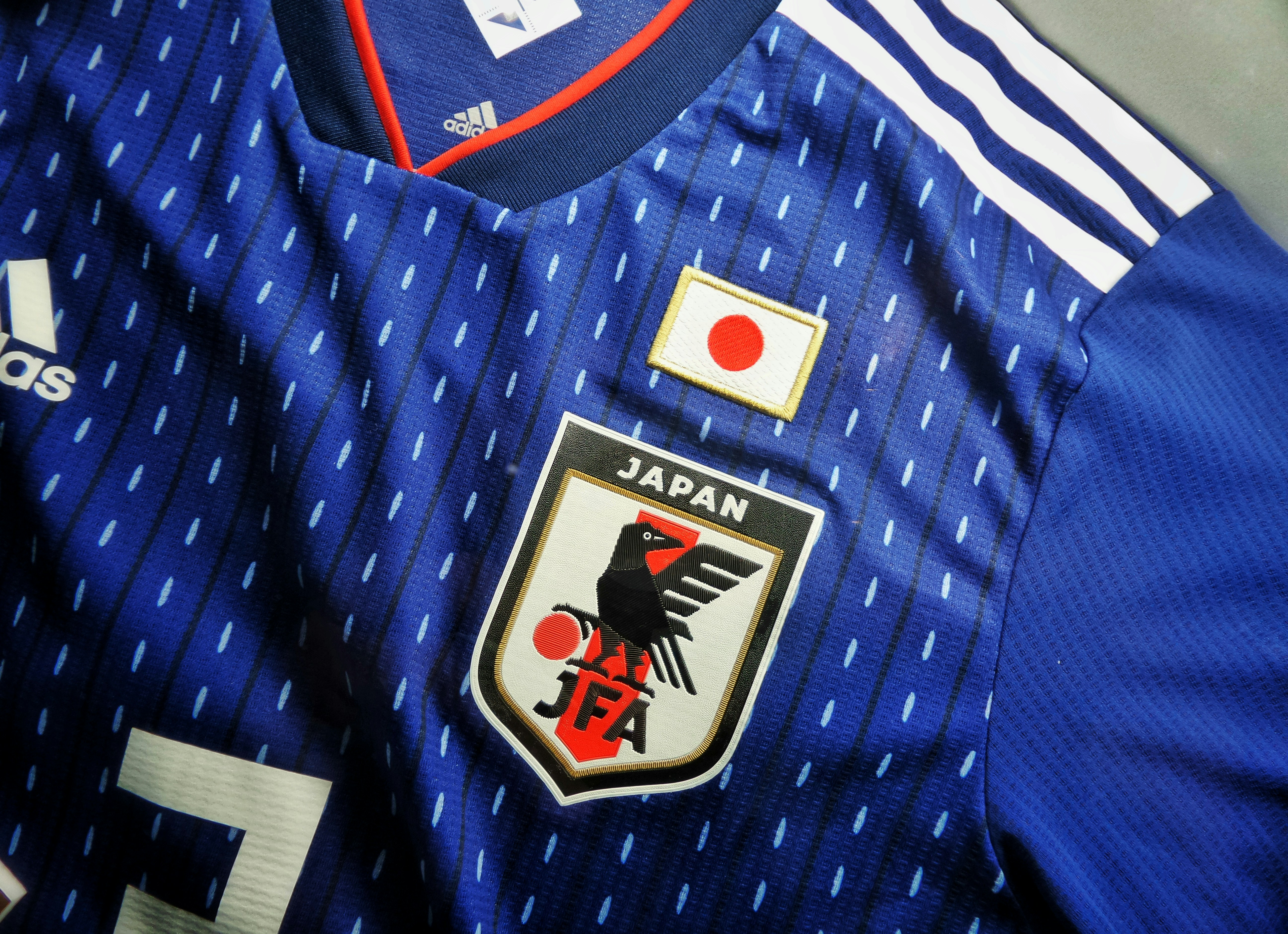 blue and white adidas jersey