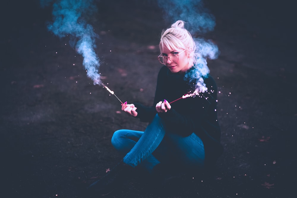 woman holding fireworks