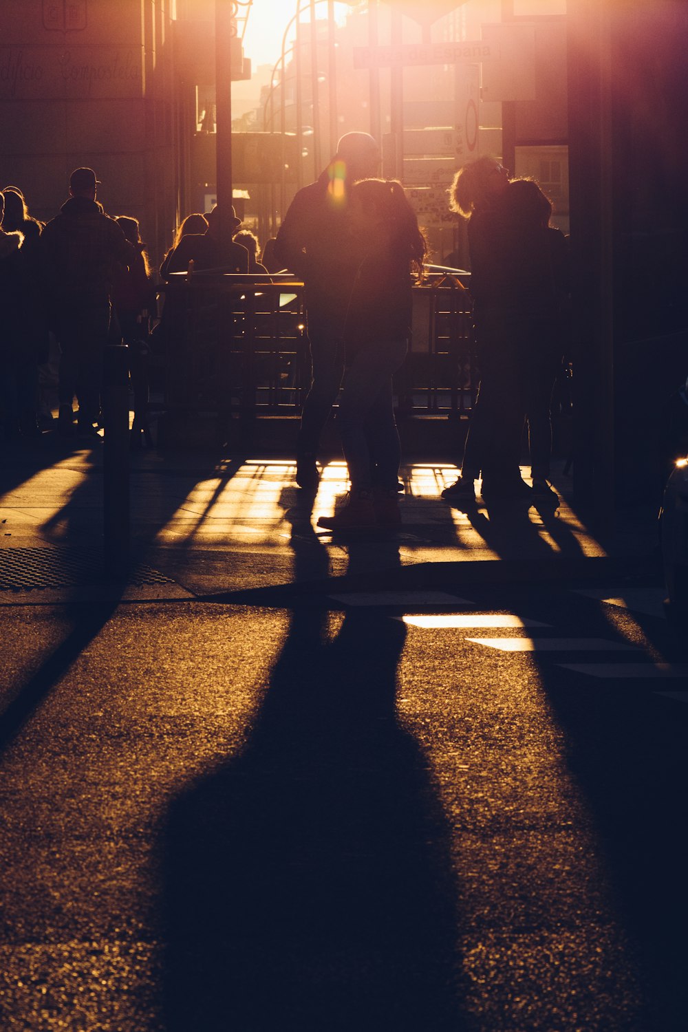 silhouette of people on street